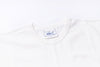 White t-shirt with a brand label on a white background