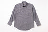 Striped shirt with button details on a white background