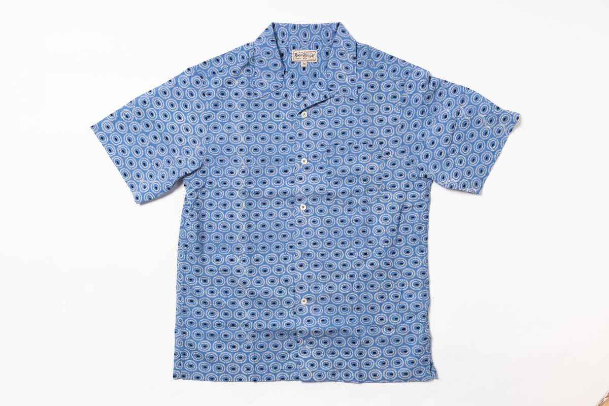 Blue patterned shirt on a white background