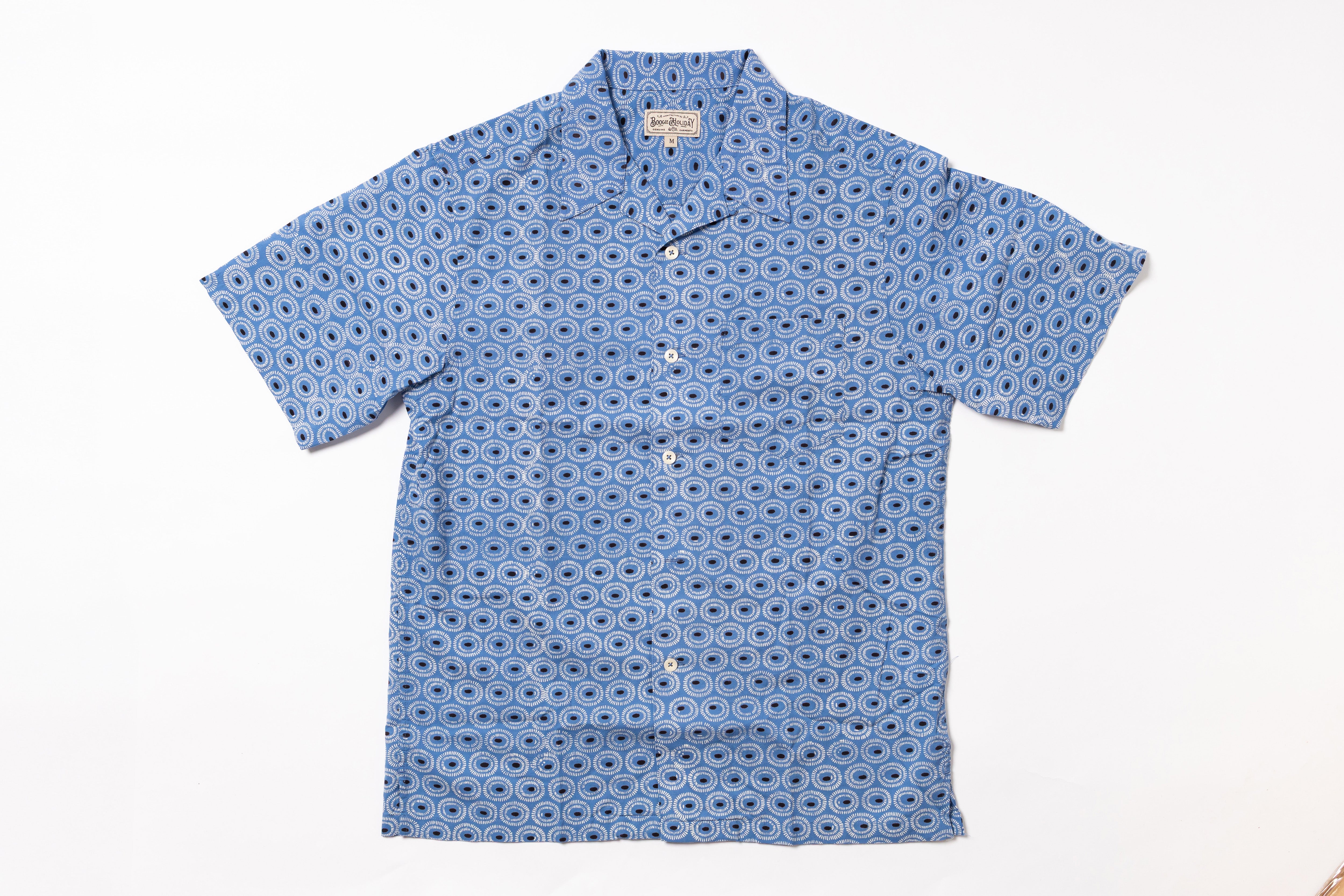 Blue patterned shirt on a white background