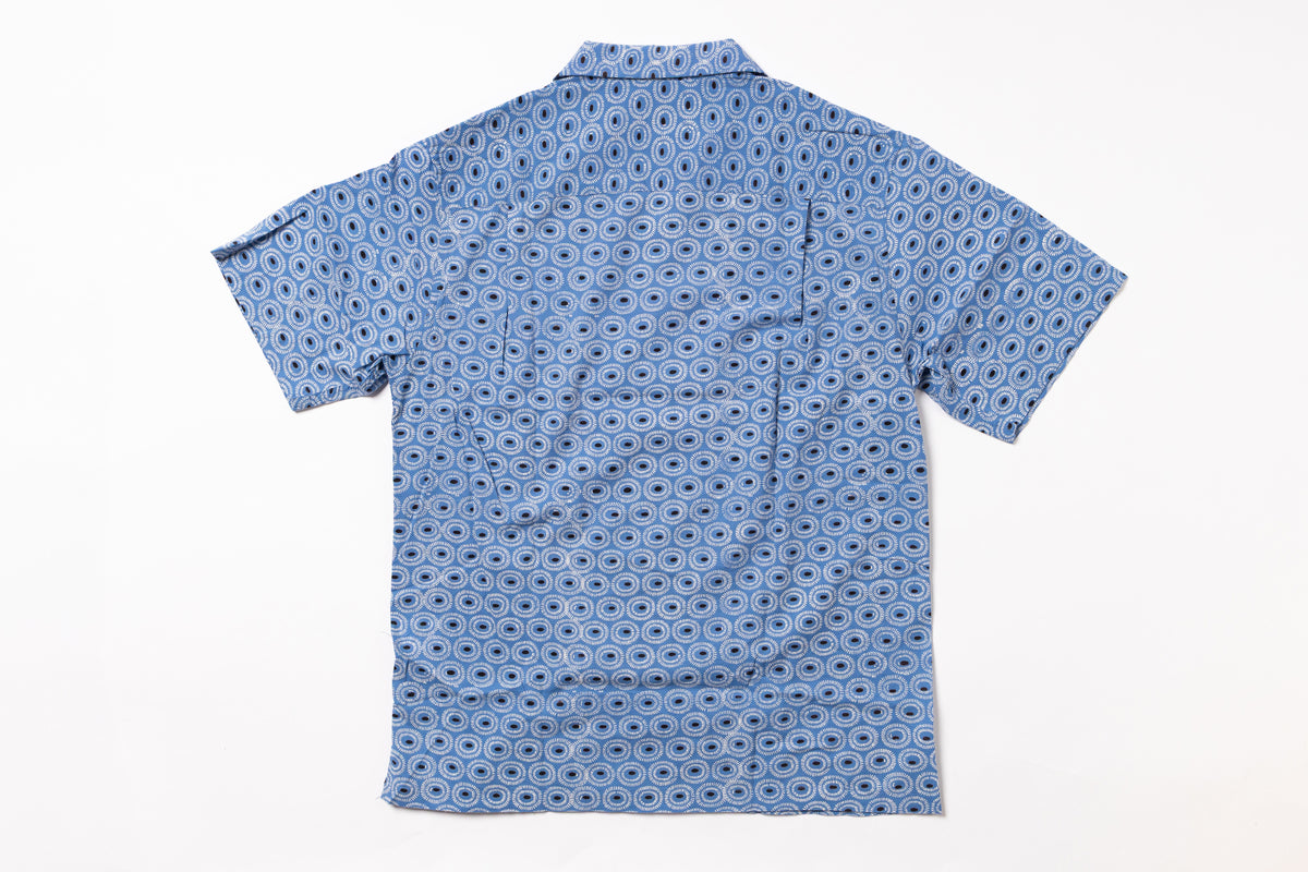 Blue patterned shirt on a white background