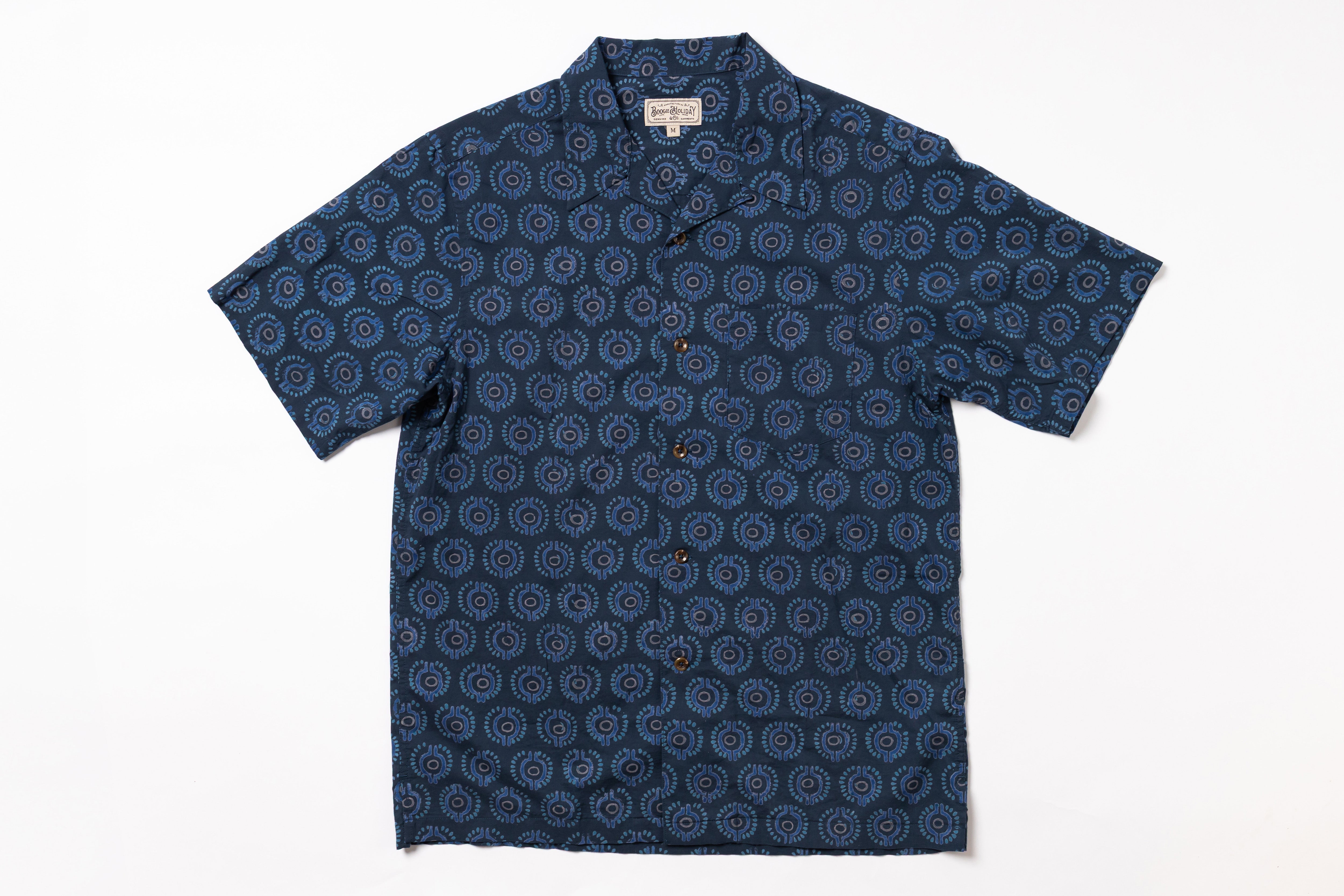 Blue patterned shirt on a white background