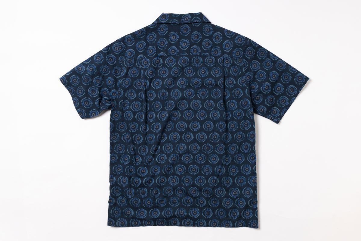 Navy patterned shirt on a white background