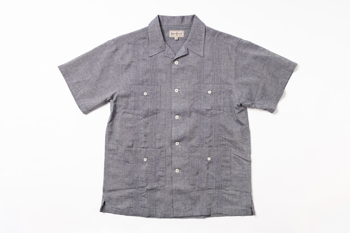 Gray checkered short-sleeve shirt on a white background