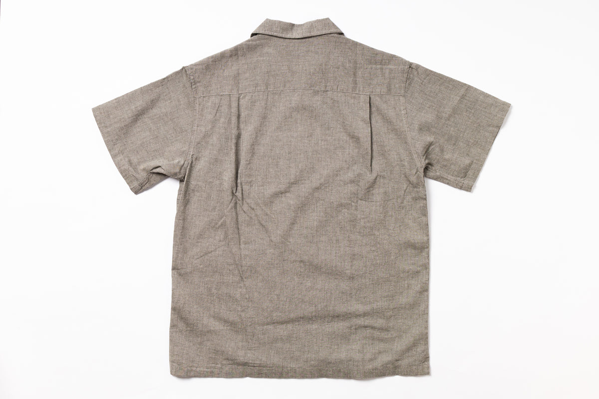 Back view of a brown short-sleeve shirt on a white background