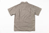 Back view of a brown short-sleeve shirt on a white background