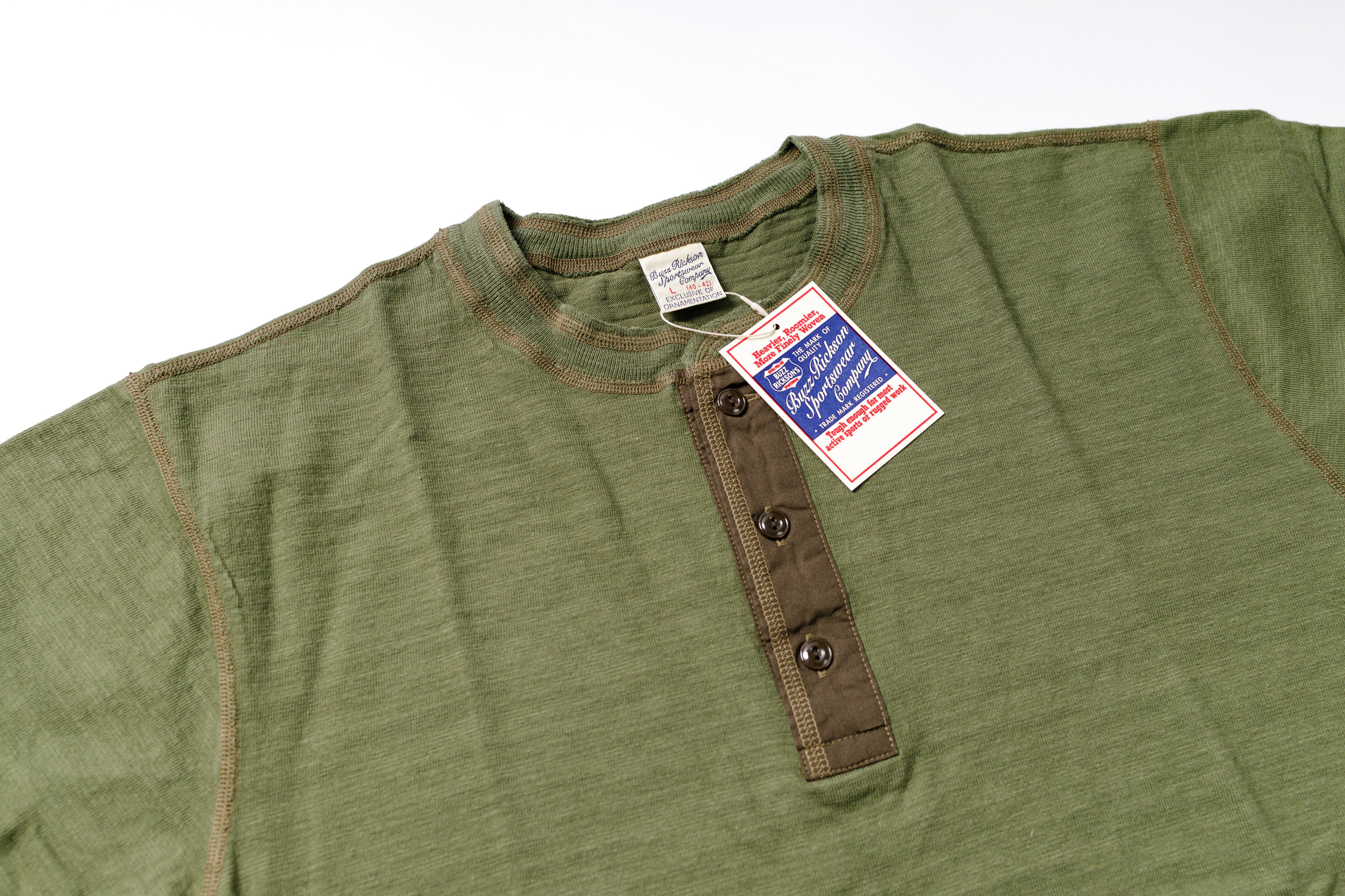 Green shirt with a tag on a white background