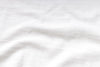 White fabric texture with subtle folds
