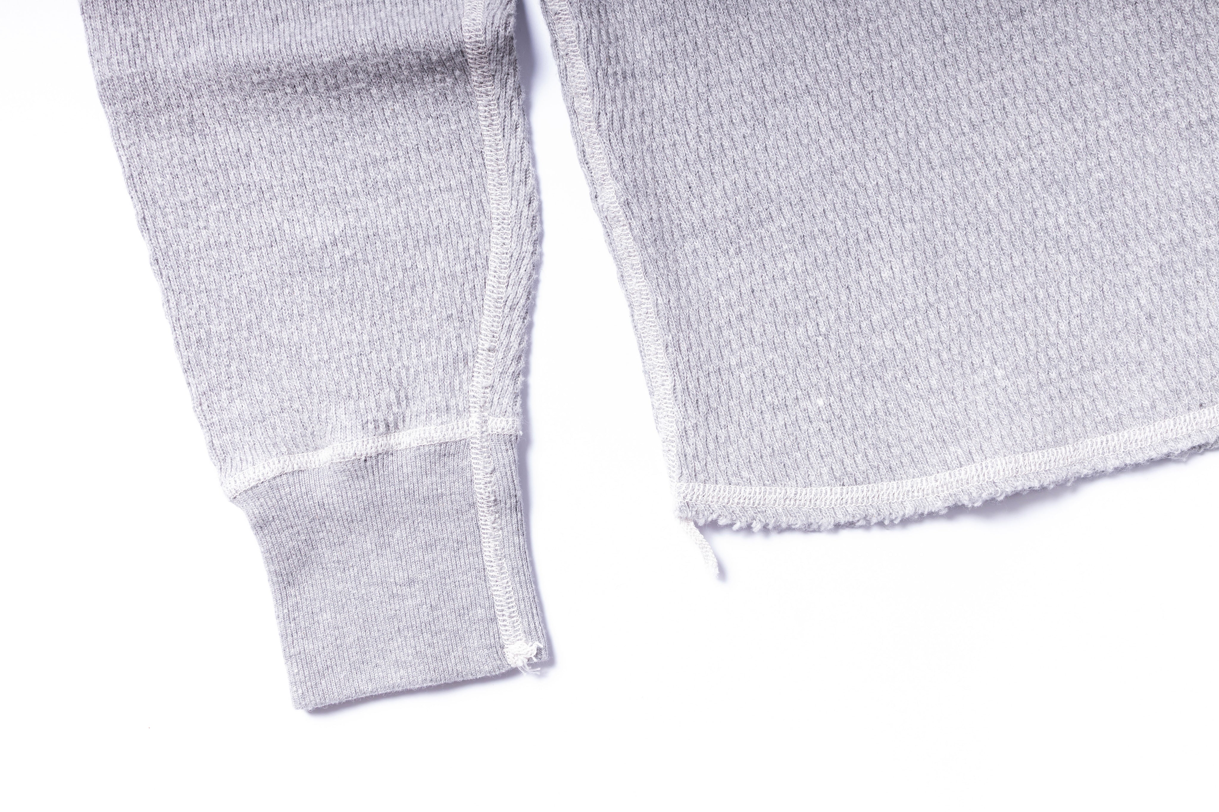 Close-up of textured white fabric on a white background