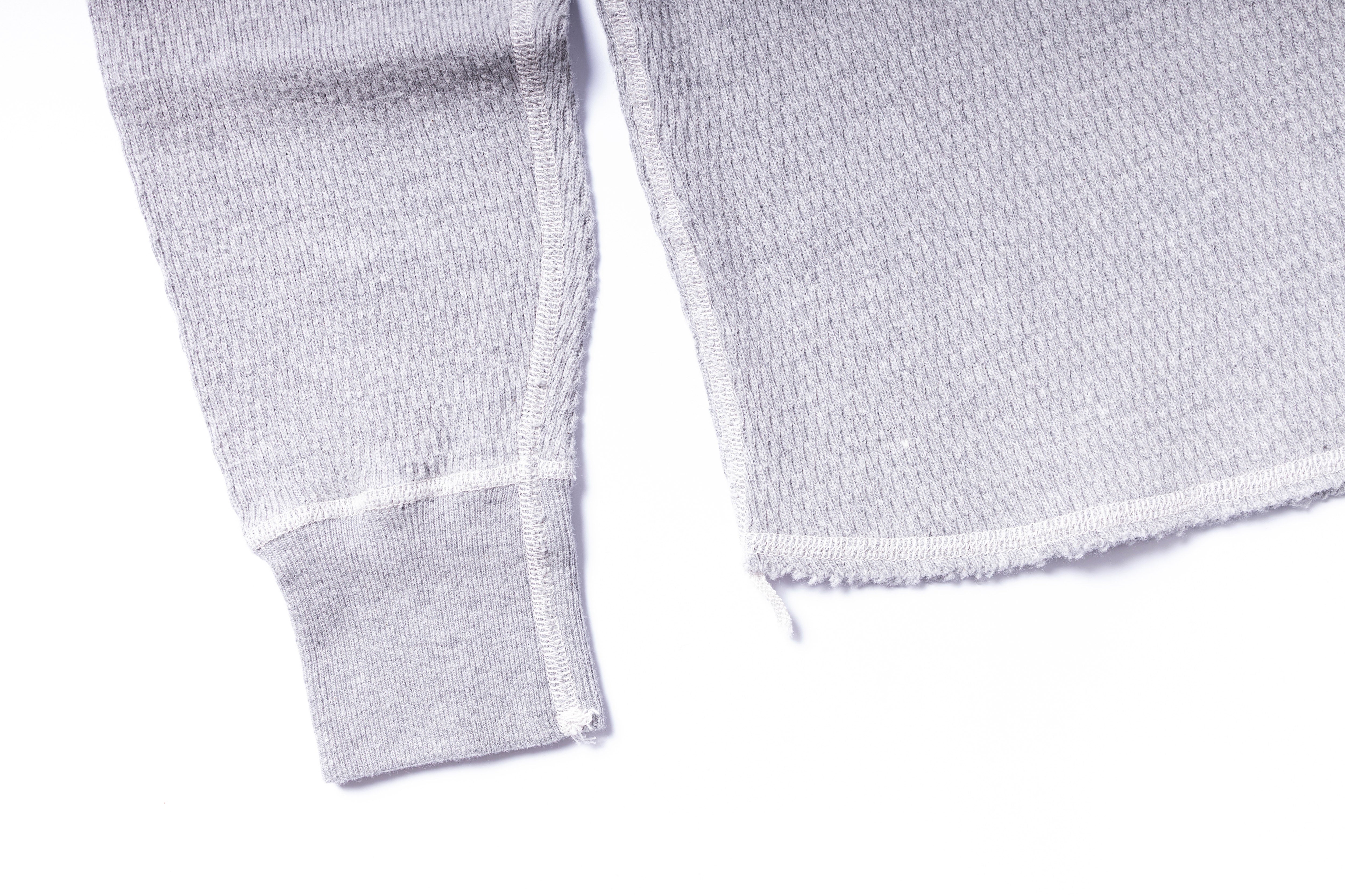 Close-up of textured white fabric on a white background