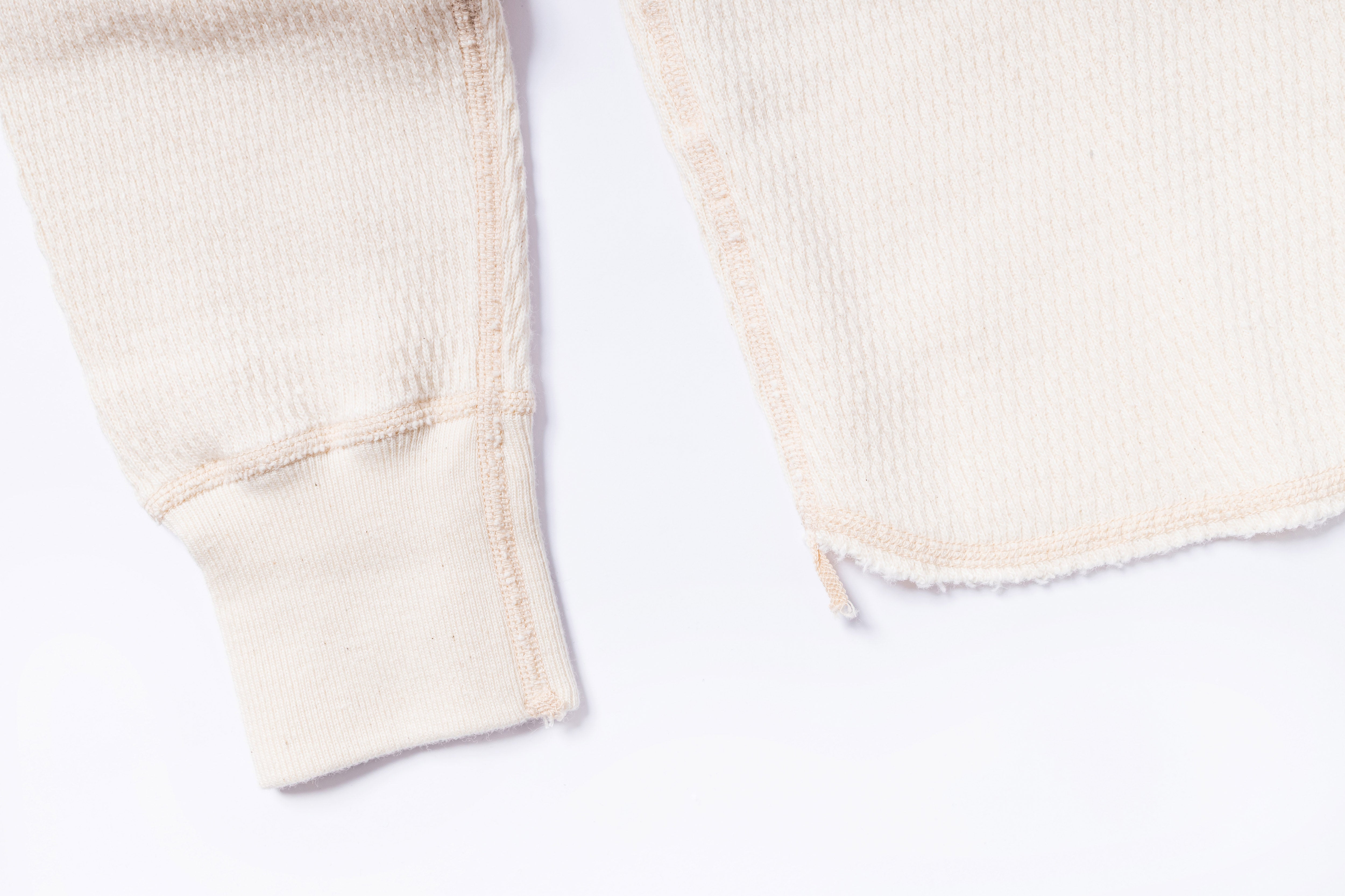 Close-up of beige fabric on a white background