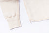 Close-up of beige fabric on a white background