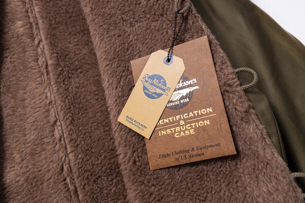 Brown textured fabric with a tag on a white background