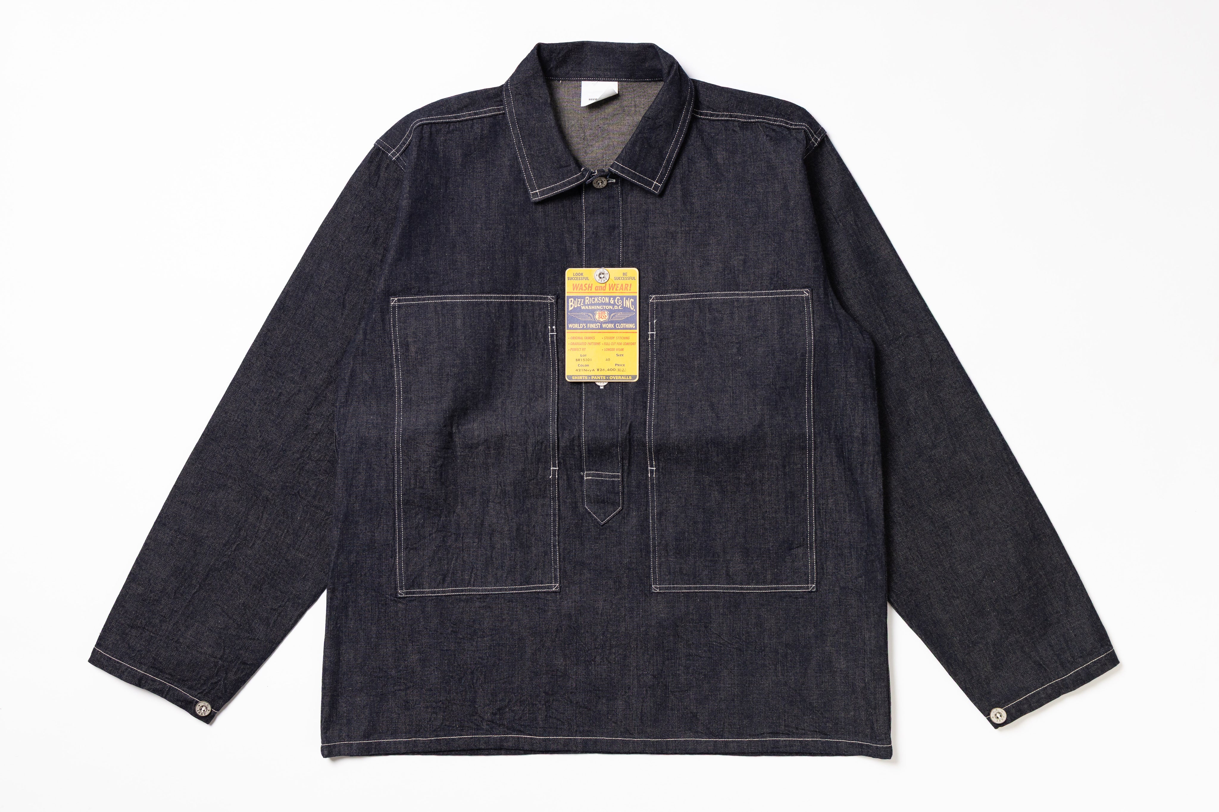 Dark denim jacket with a visible brand label on a white background