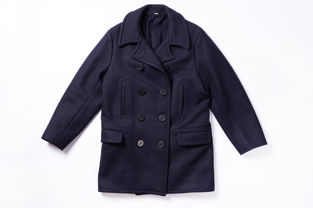 Navy blue coat on a white background