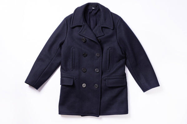 Navy blue coat on a white background