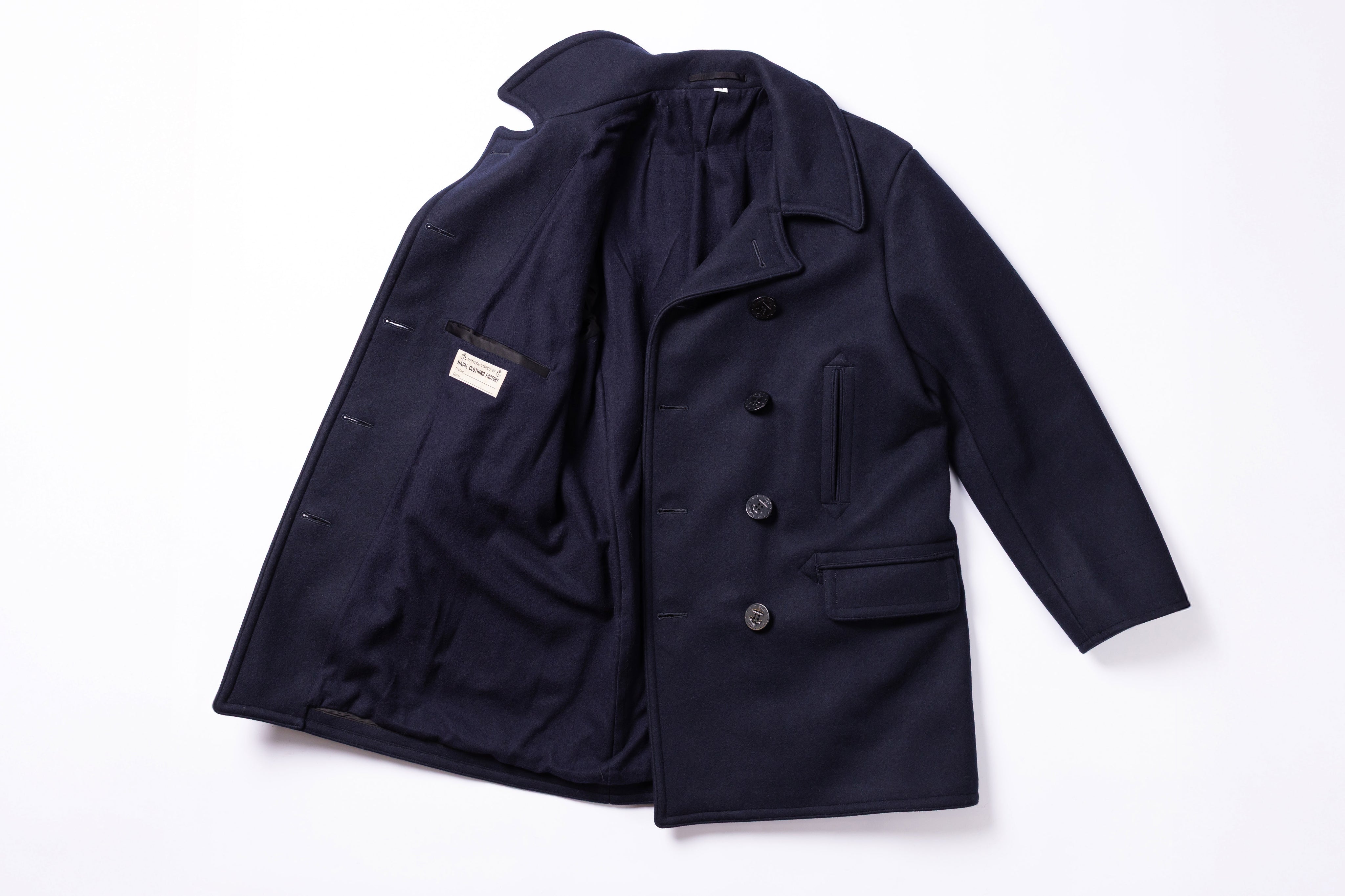Navy blue coat on a white background