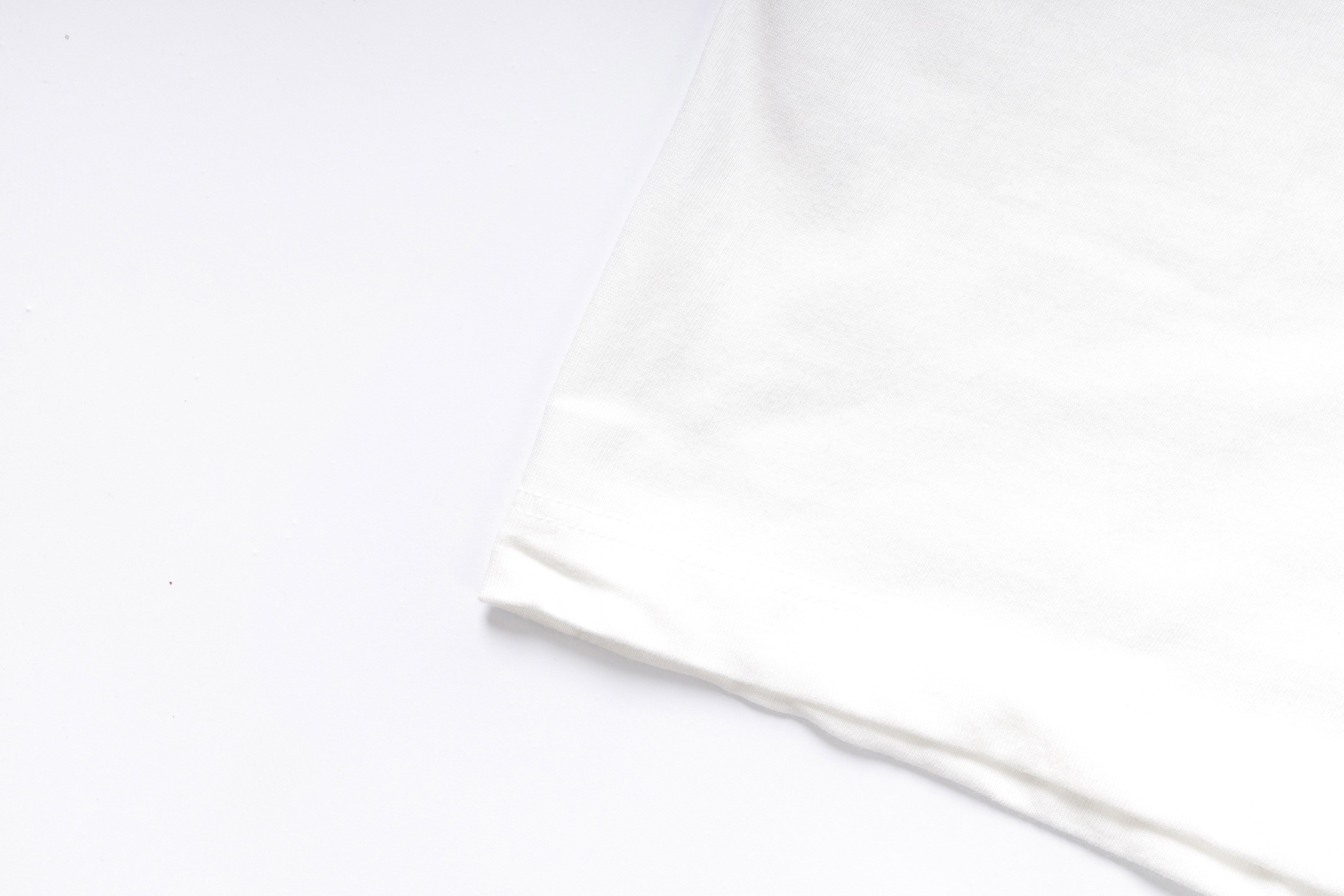 Thin white rod on a light gray background