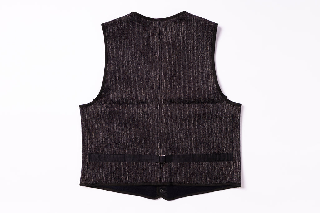 Dark gray vest on a white background