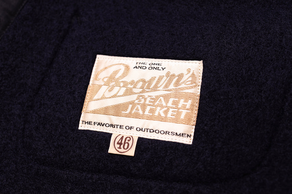 Label on a black jacket with text 'The One and Only Brown's Beach Jacket' and number '46'.