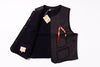 Black vest with a red ribbon on a white background
