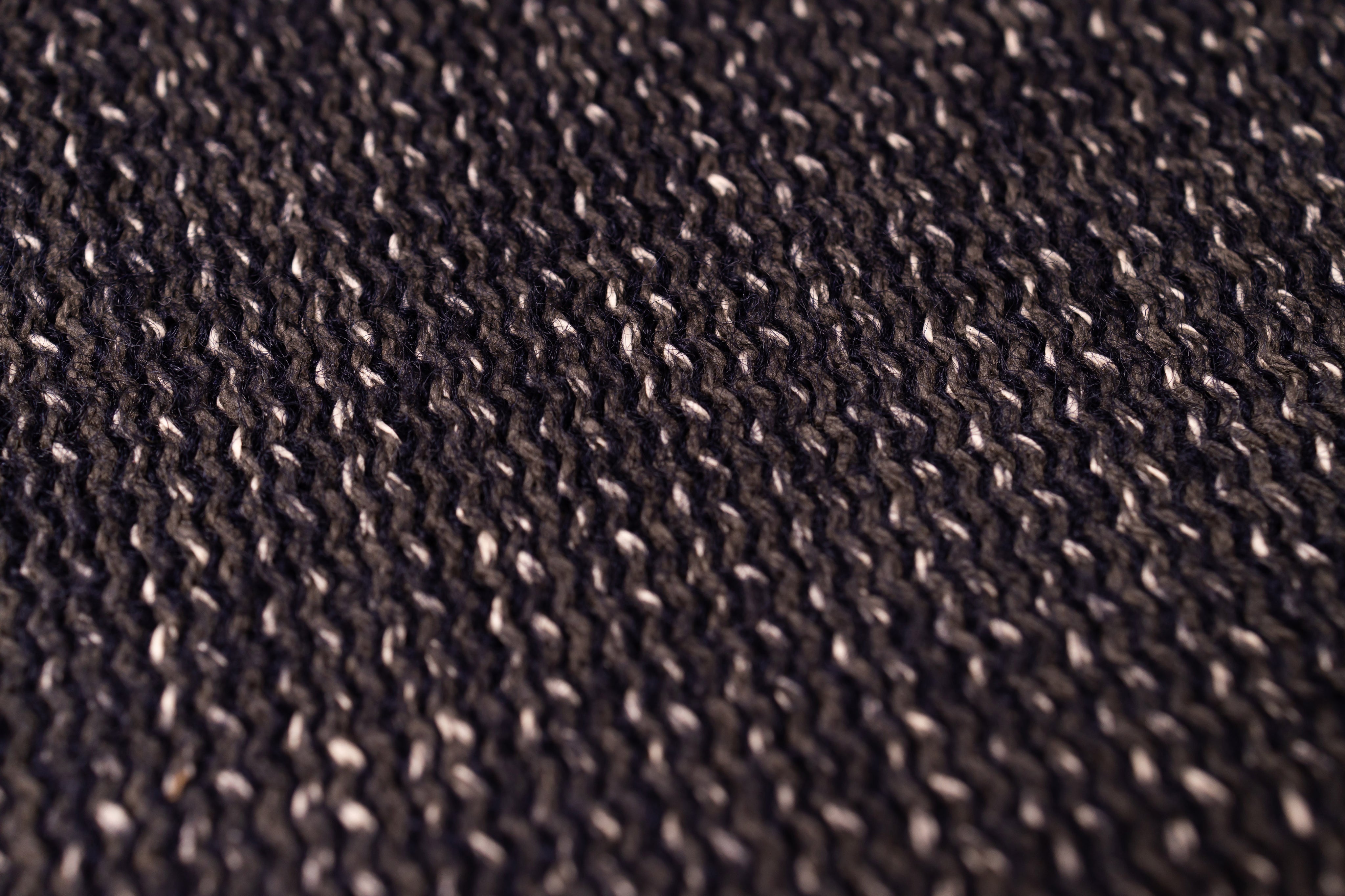 Close-up of a textured brown fabric surface