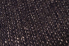 Close-up of a textured brown fabric surface