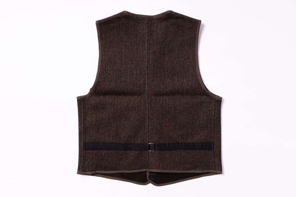Brown vest on a white background