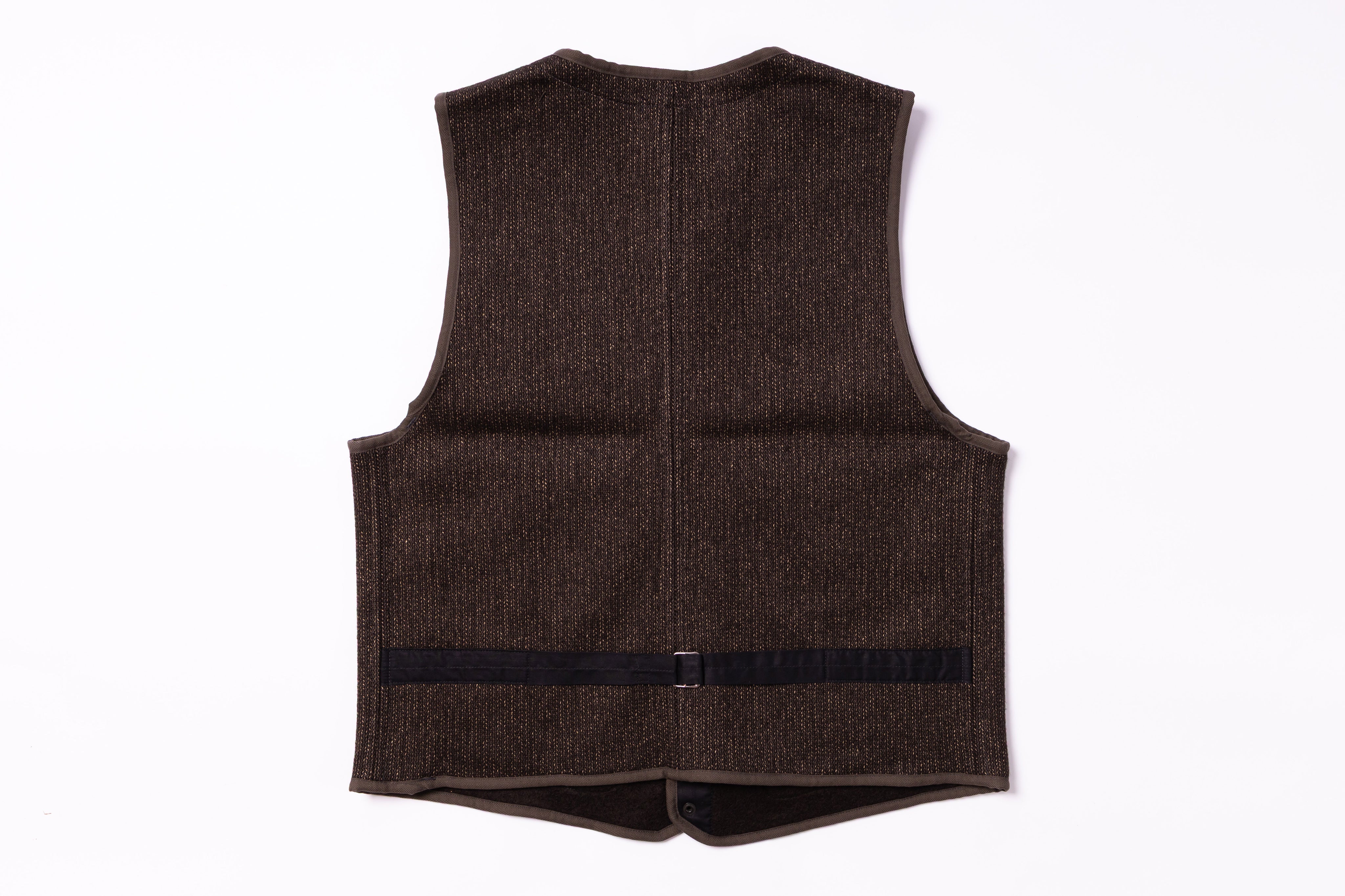 Brown vest on a white background