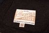 Label on a black jacket with 'Brown's Beach Jacket' text