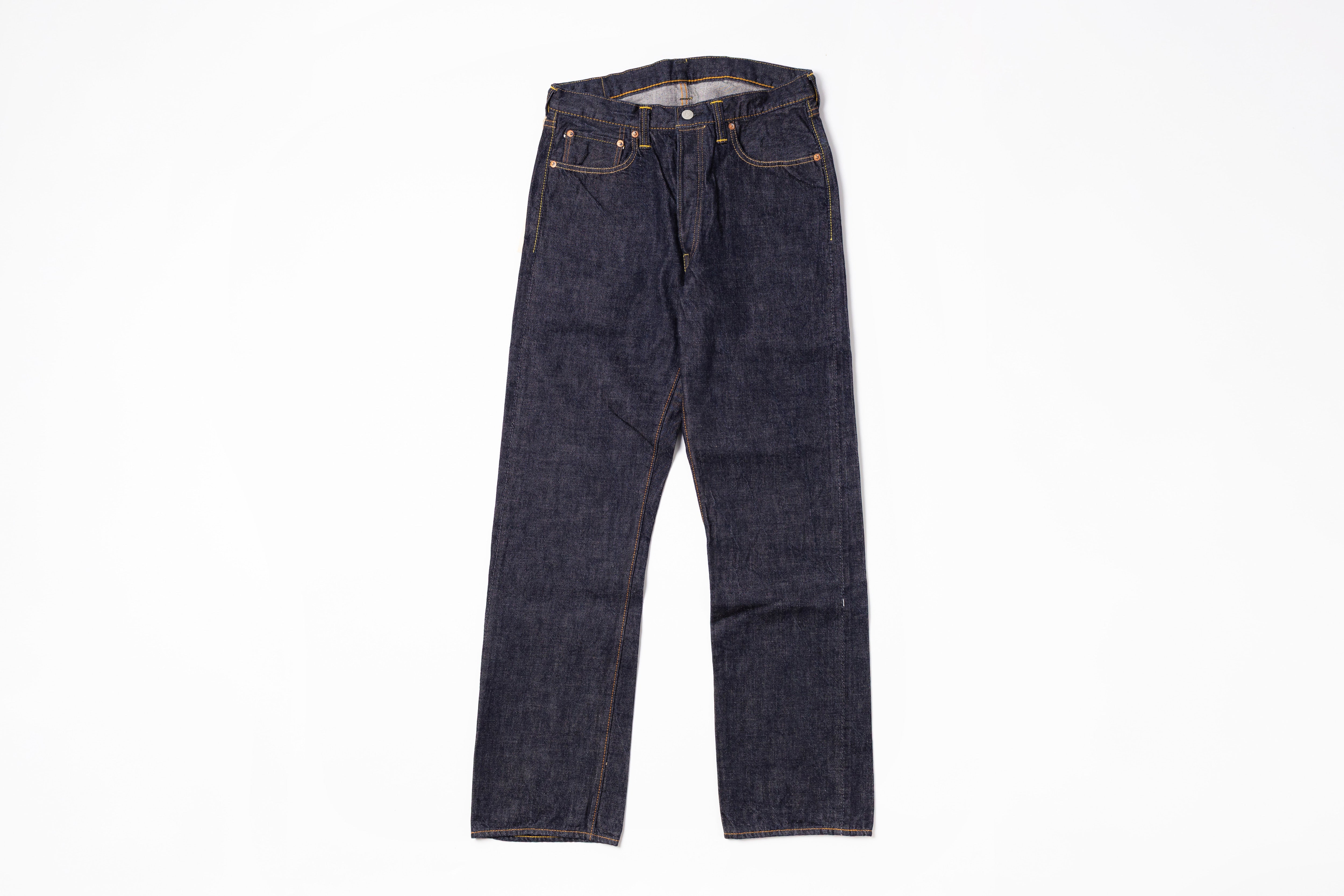 Pair of dark blue jeans on a white background