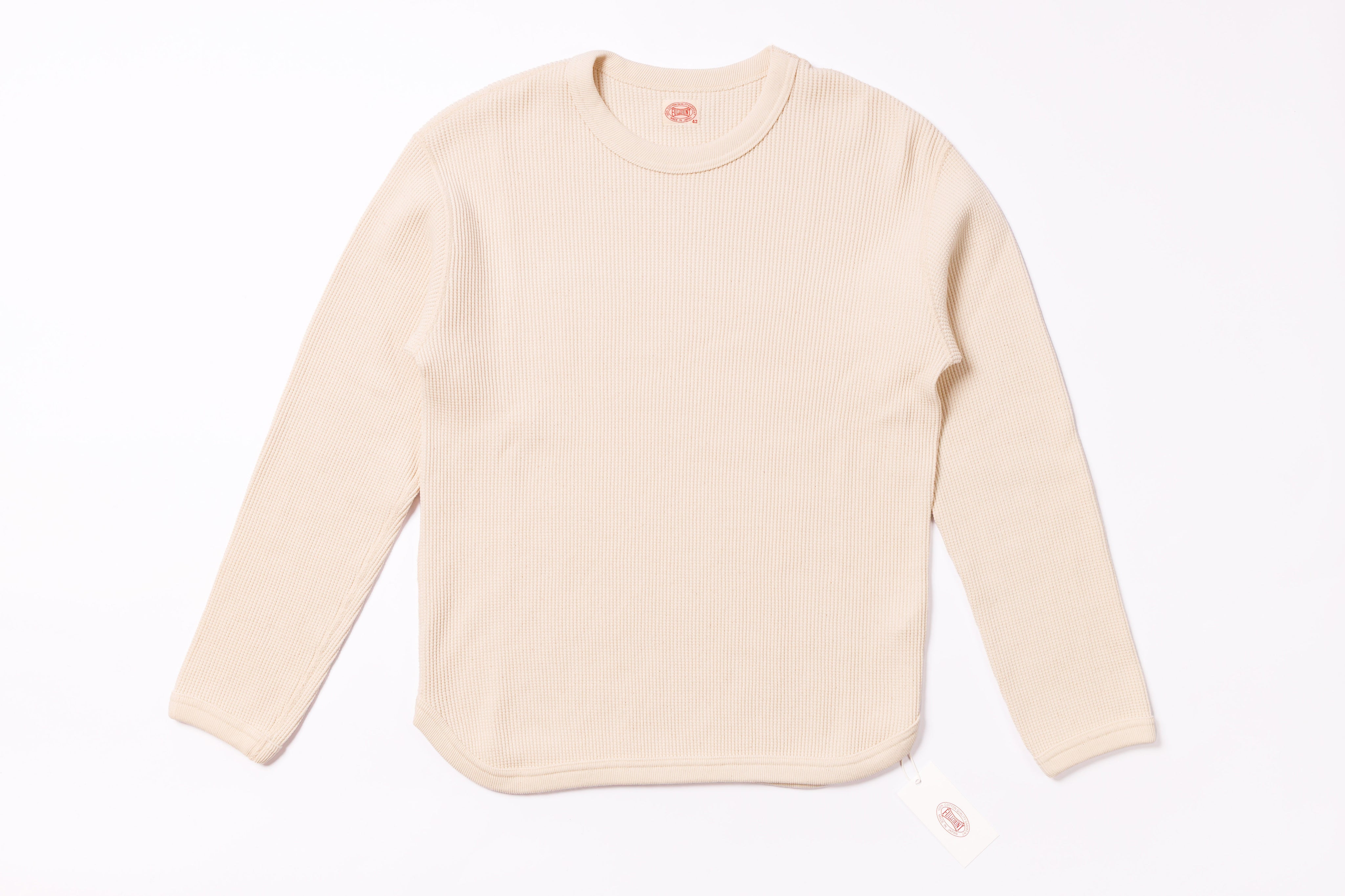 Beige long-sleeve shirt on a white background