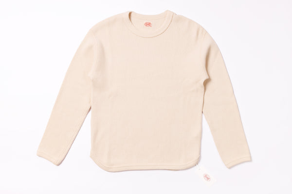 Beige long-sleeve shirt on a white background