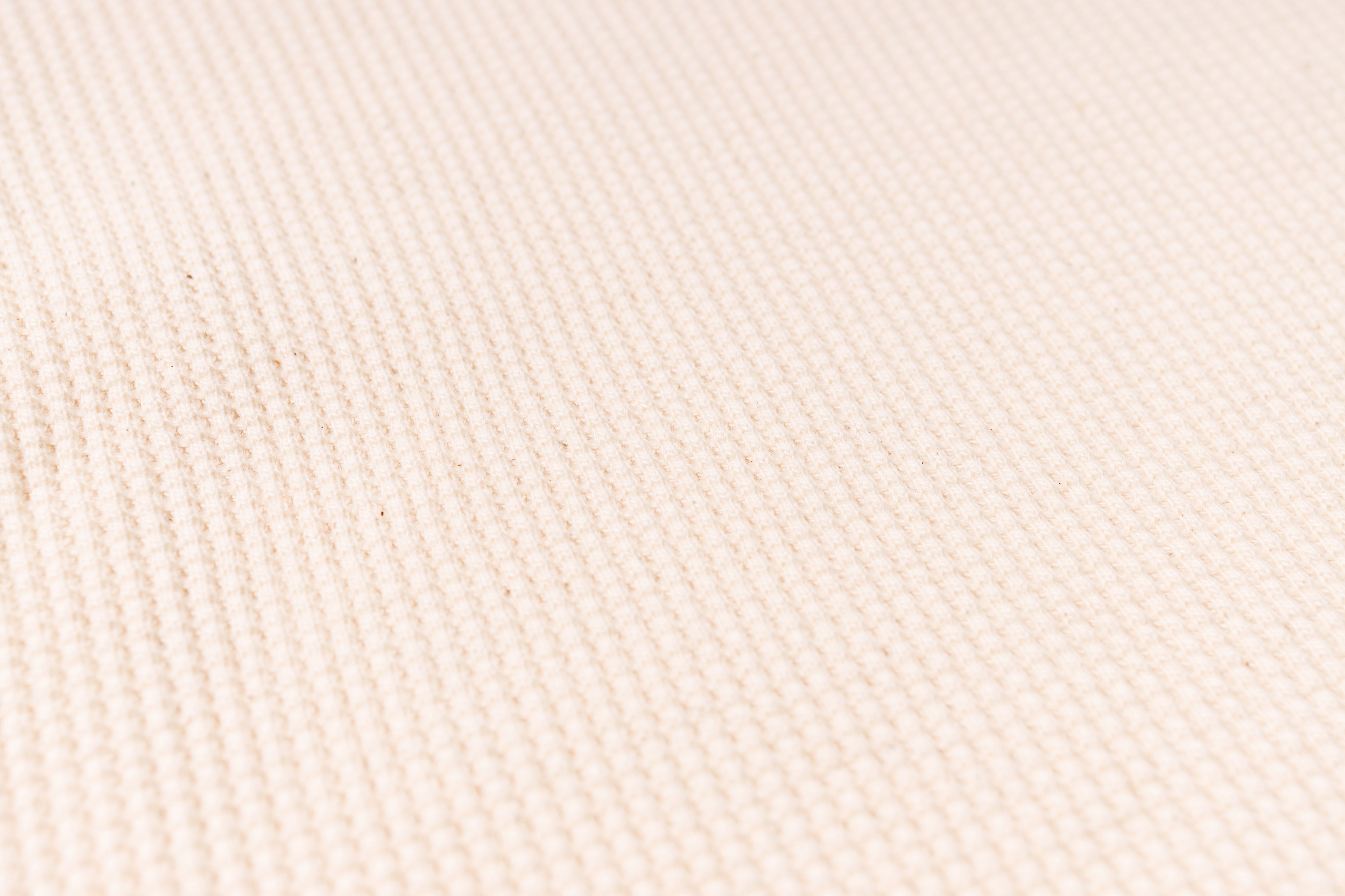 Close-up of beige fabric texture