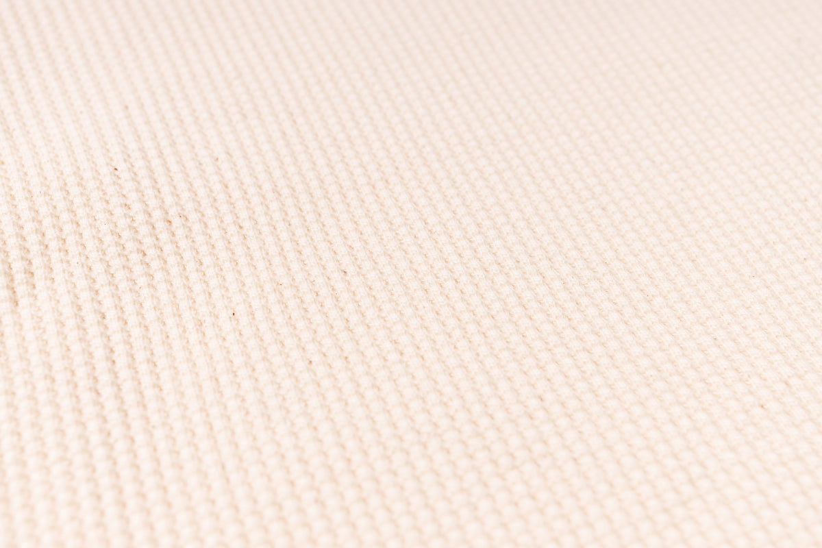 Close-up of beige fabric texture