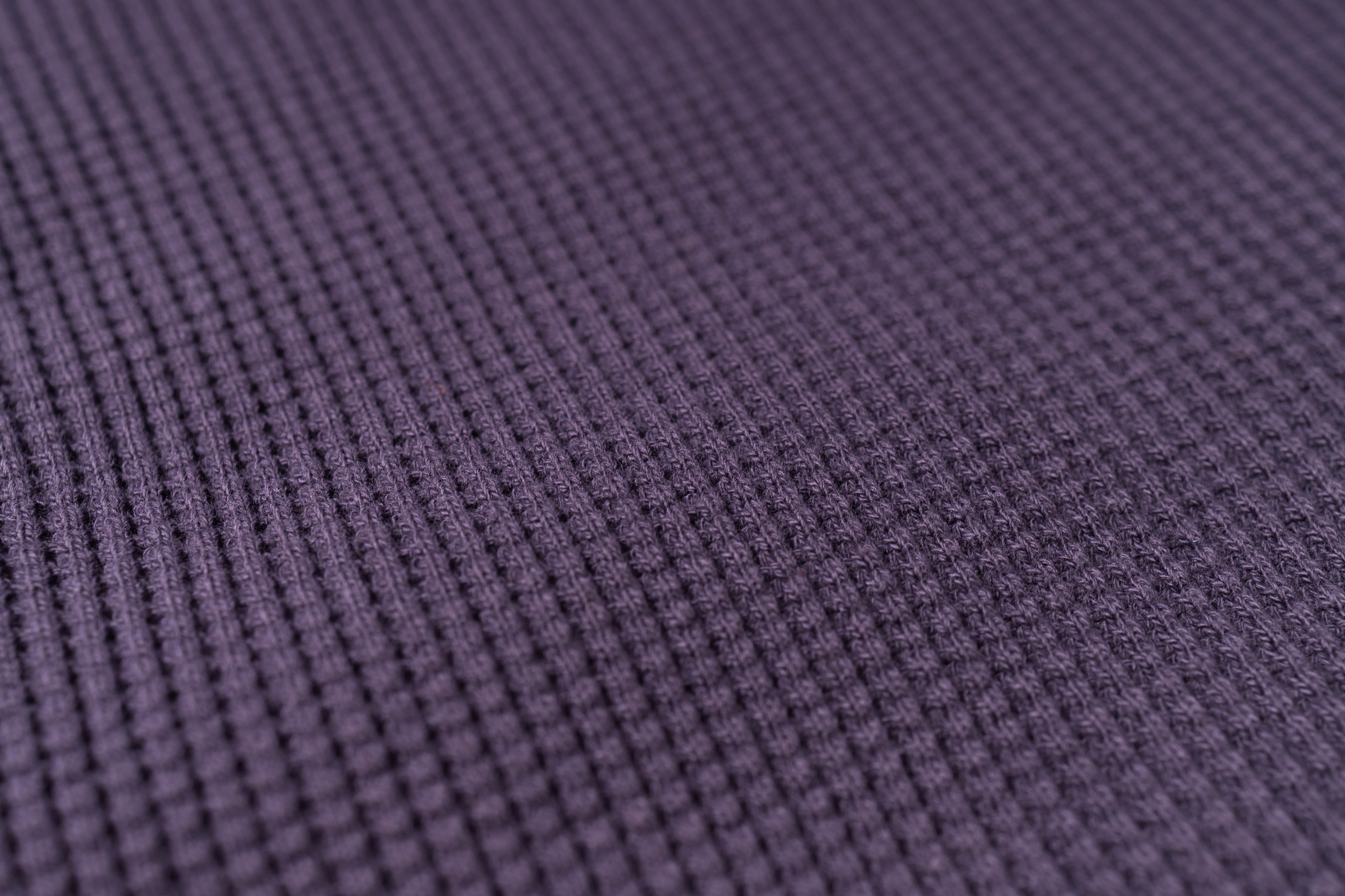 Close-up of purple textured fabric