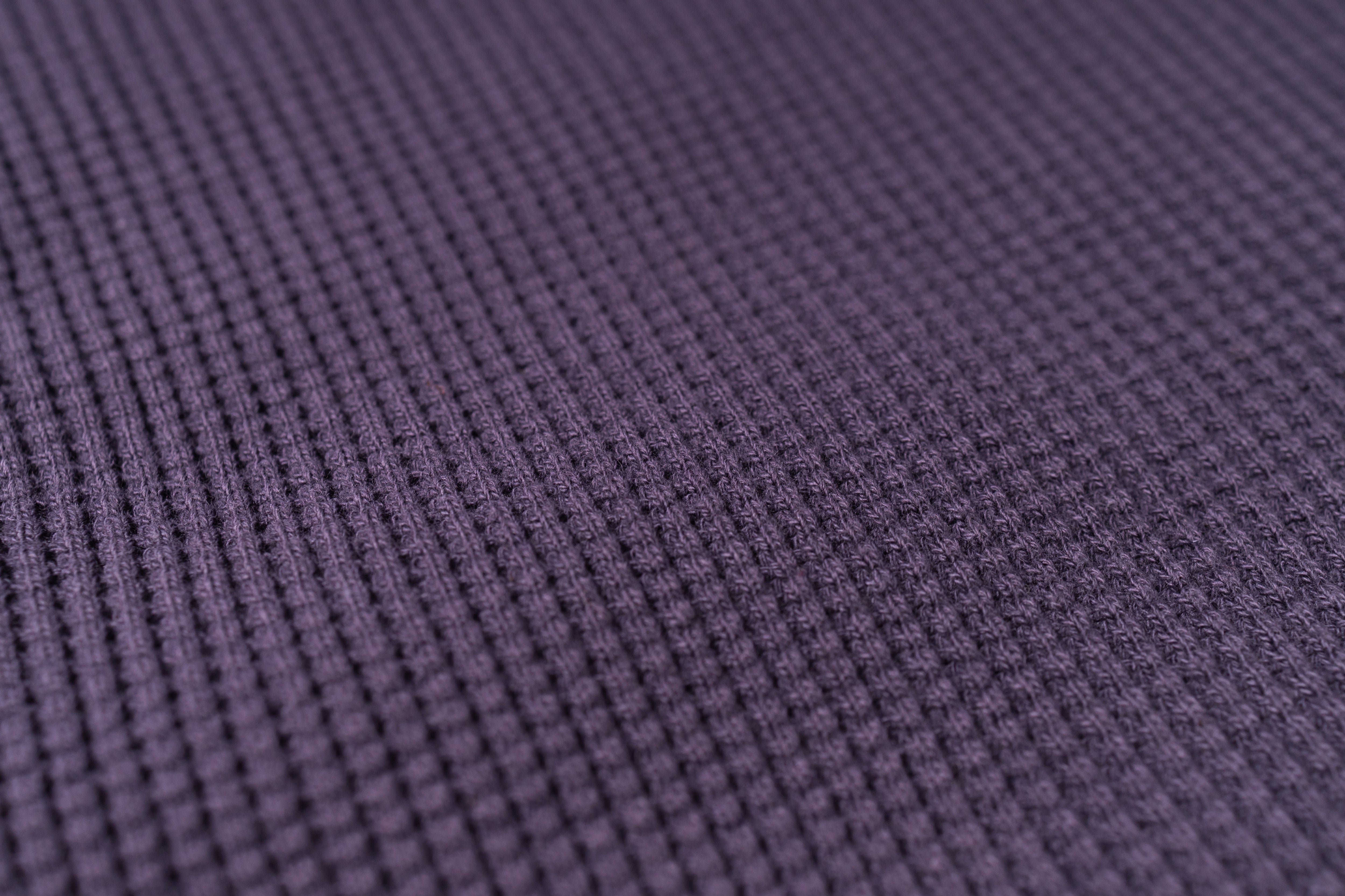 Close-up of purple textured fabric