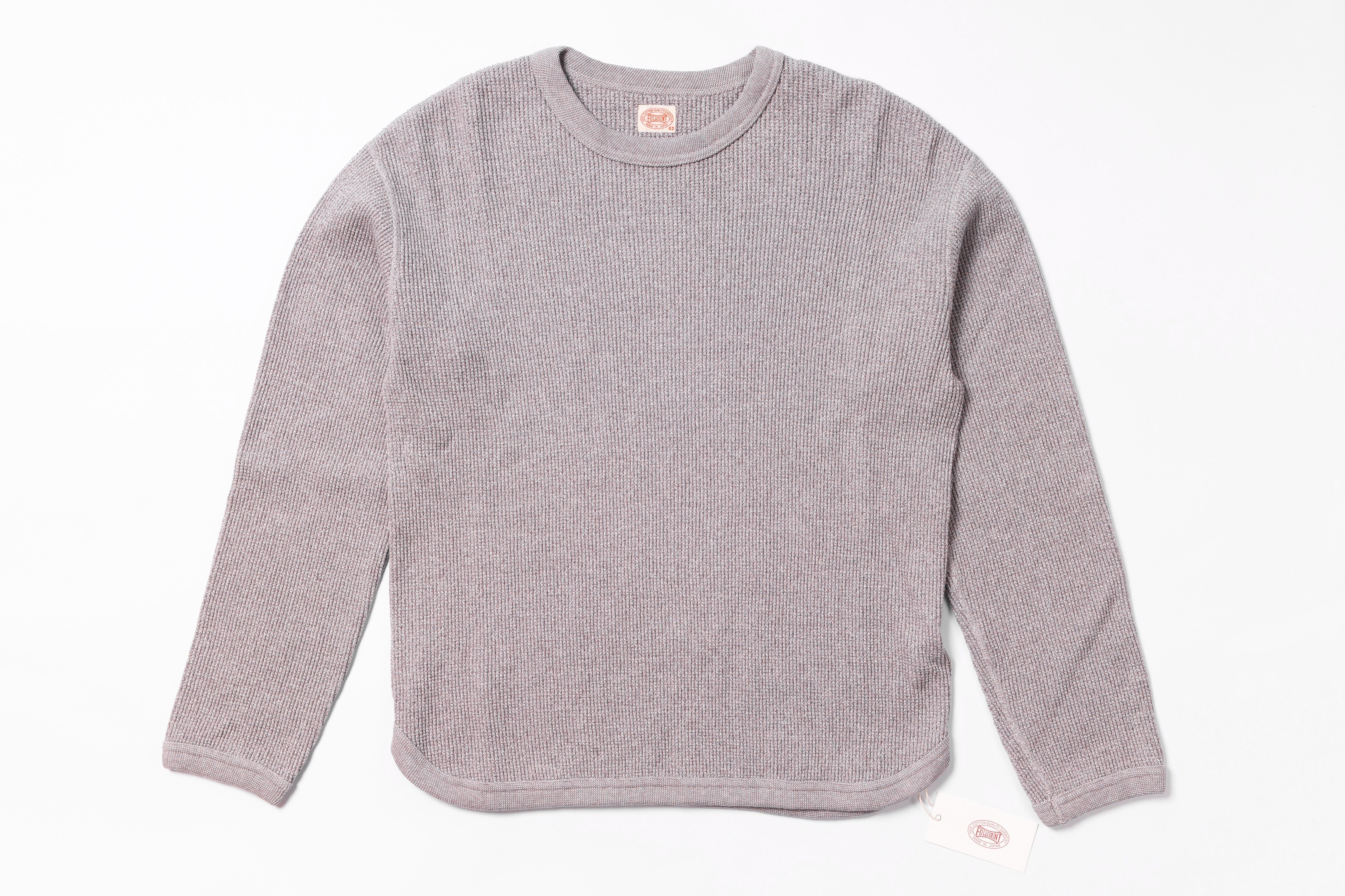 Gray long-sleeve shirt on a white background