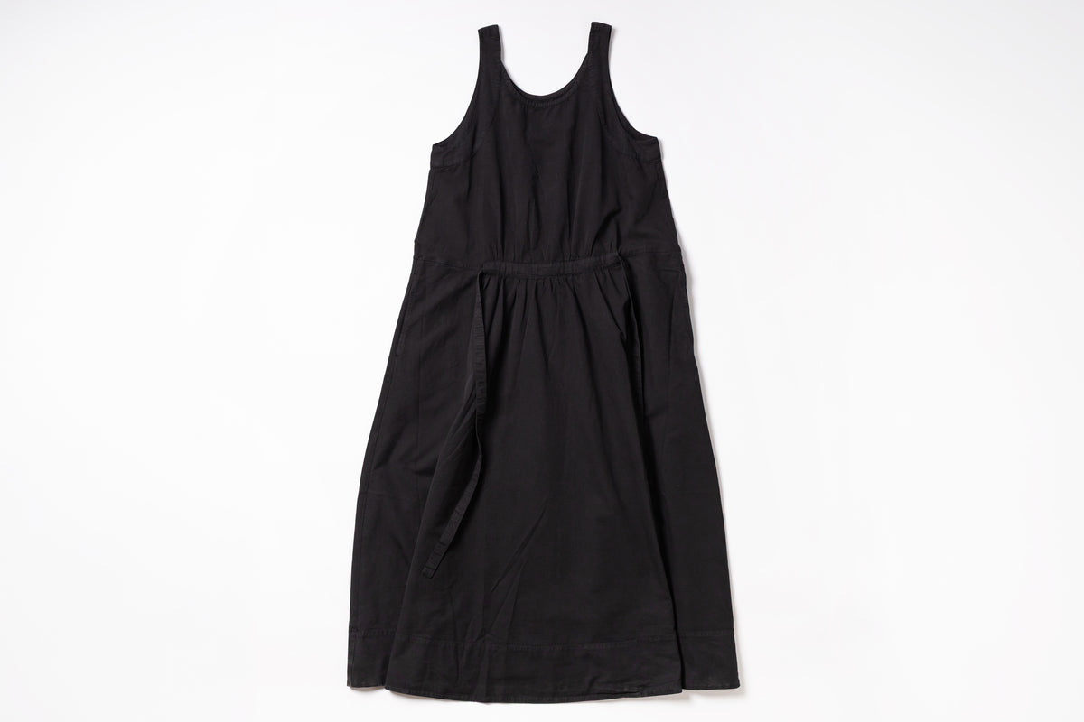 Black sleeveless dress on a white background