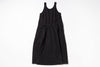 Black sleeveless dress on a white background