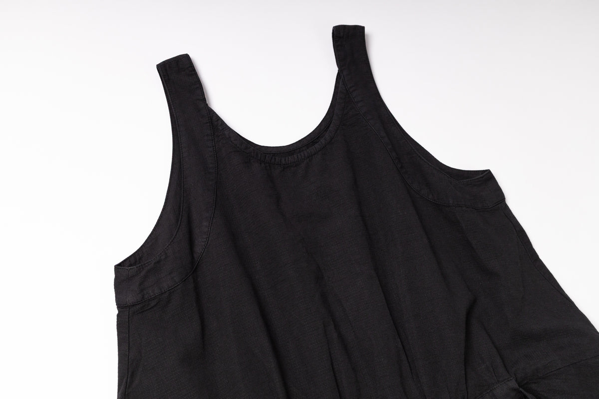 Black sleeveless top on a white background
