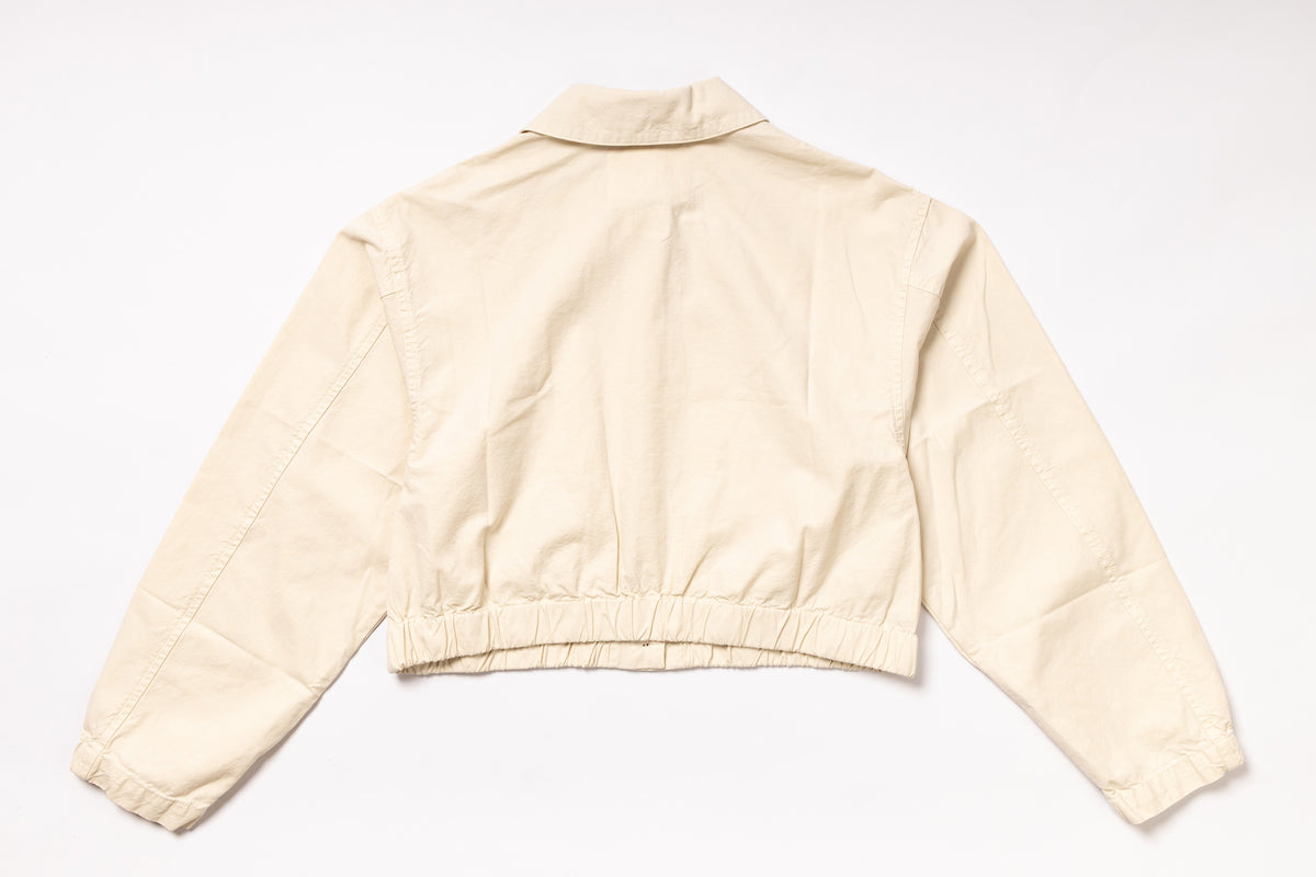 Beige jacket on a white background