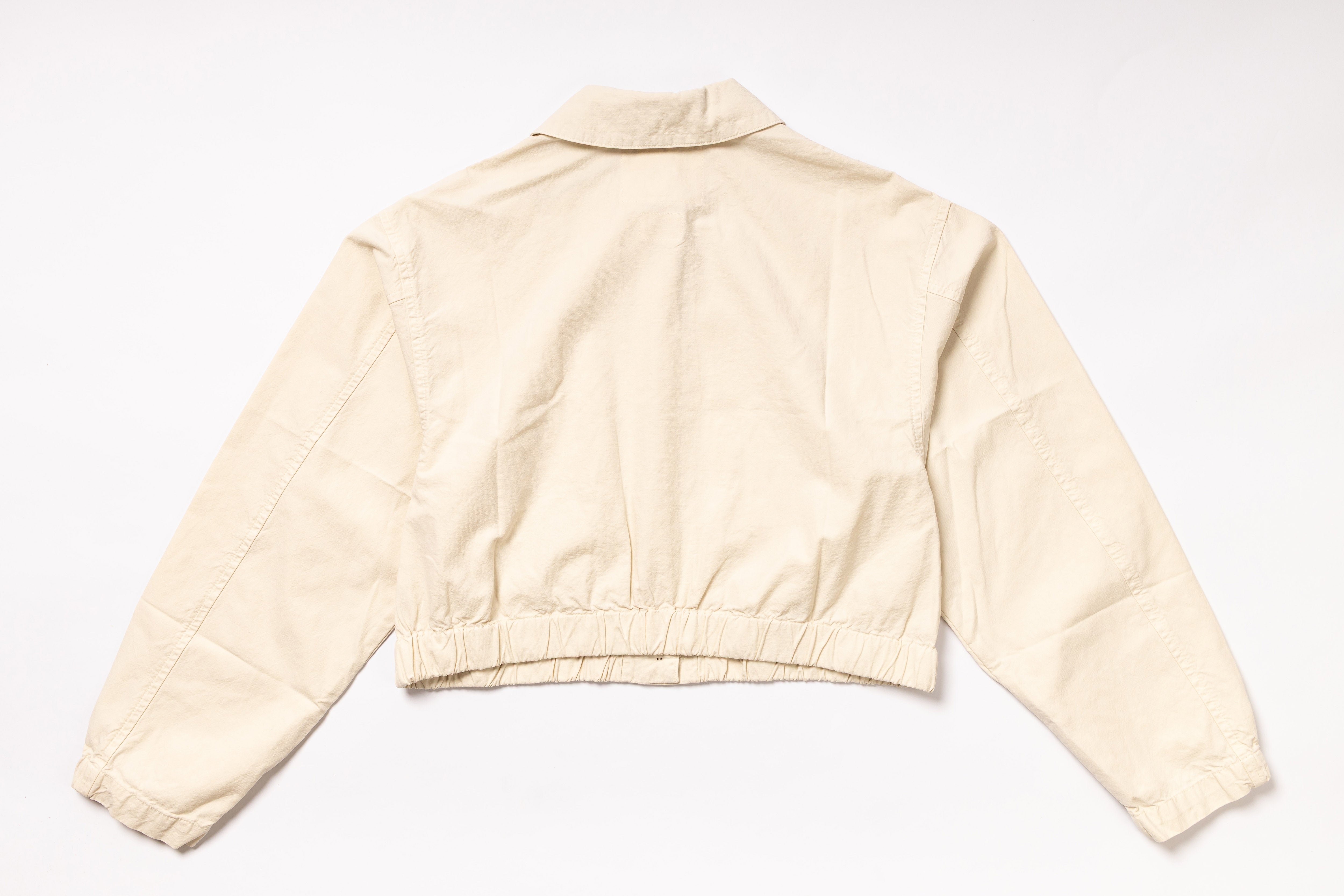 Beige jacket on a white background