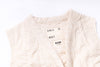 Beige quilted jacket with 'GIRLS OF DUST' text on a white background
