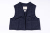 Navy blue vest with a brand label on a white background