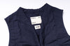 Navy blue sleeveless jacket with a brand label on a white background