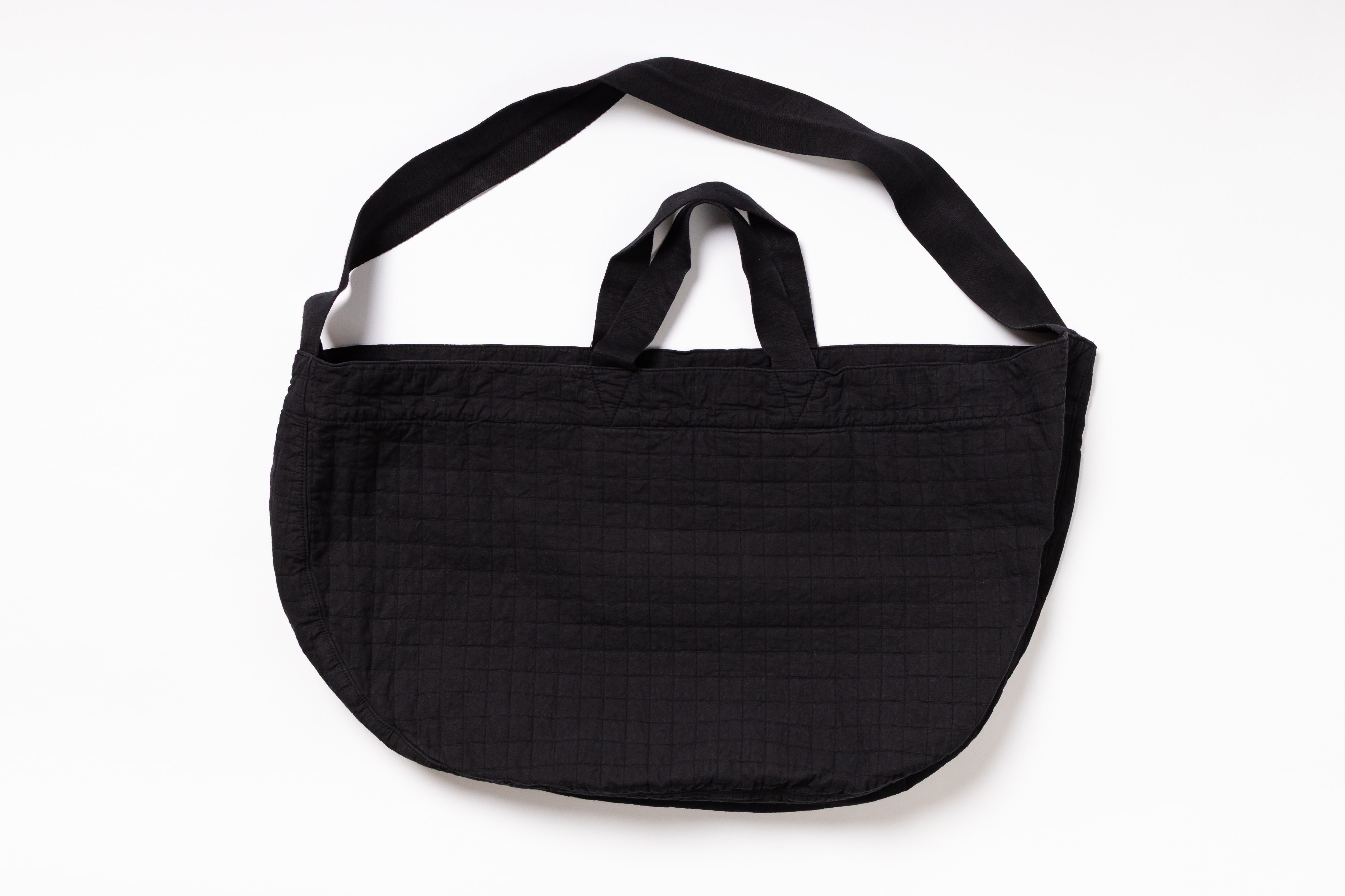 Black shoulder bag on a white background