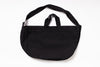 Black shoulder bag on a white background
