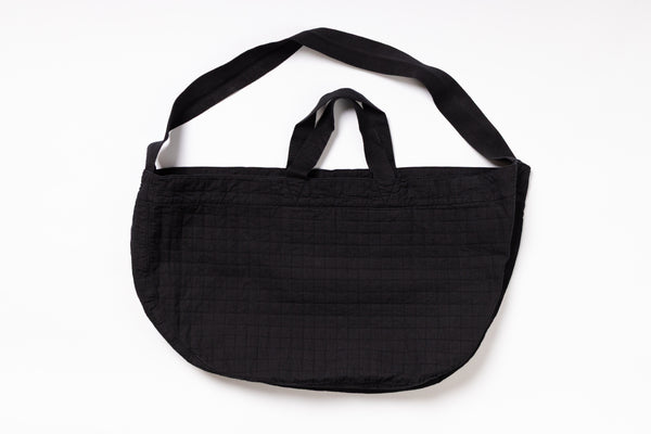 Black shoulder bag on a white background