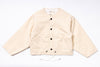 Beige quilted jacket with button details on a white background